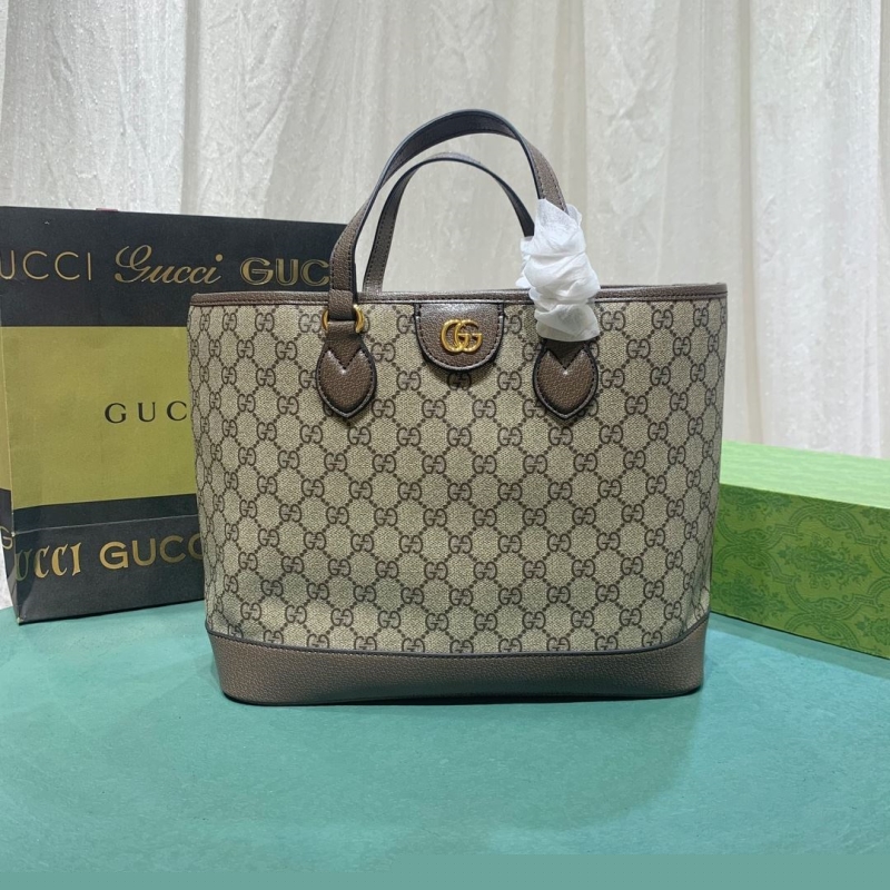 G*u*i shopping bags